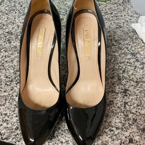 Prada round toe pumps.  Patent leather.
